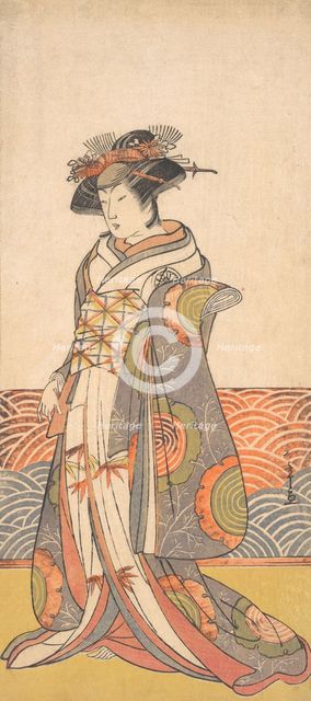 The Third Segawa Kikunojo as a Woman Standing in a Room Having a Wave-pattern Dado, ca. 1779. Creator: Shunsho.