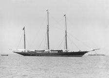 The three mast auxiliary sailing yacht Utopia at anchor, 1913. Creator: Kirk & Sons of Cowes