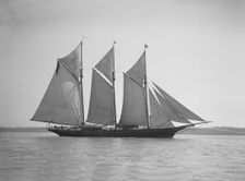 The three-mast auxiliary schooner Invincible 1911. Creator: Kirk & Sons of Cowes