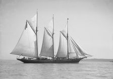 The three-mast auxiliary schooner Invincible 1911. Creator: Kirk & Sons of Cowes