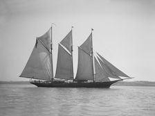 The three-mast auxiliary schooner Invincible 1911. Creator: Kirk & Sons of Cowes