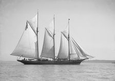 The three-mast auxiliary schooner Invincible 1911. Creator: Kirk & Sons of Cowes