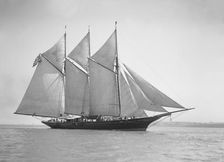 The three-mast auxiliary schooner Invincible 1911. Creator: Kirk & Sons of Cowes