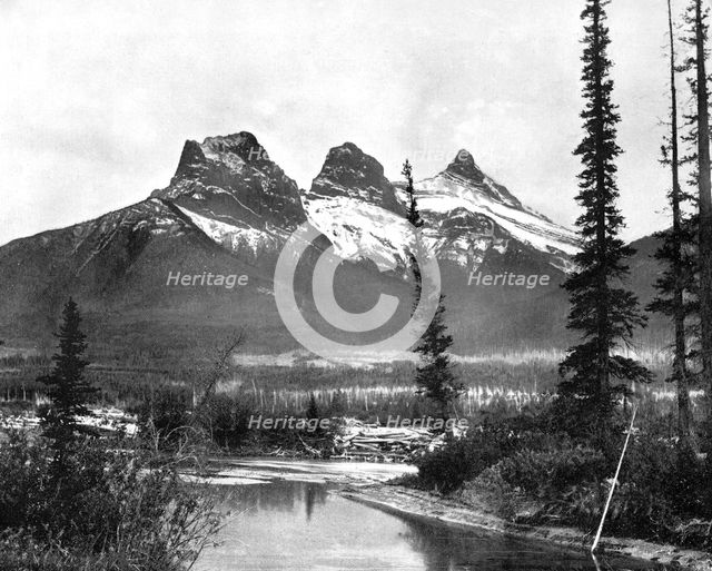 The Three Sisters, Canmore, Canadian Pacific Railway, 1893.Artist: John L Stoddard
