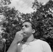 The town crier, Danny Poocchiari., Camp Nathan Hale, Southfields, New York, 1943 Creator: Gordon Parks
