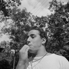 The town crier, Danny Poocchiari., Camp Nathan Hale, Southfields, New York, 1943 Creator: Gordon Parks