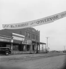 The town of Caddo in southeast Oklahoma, 1938. Creator: Dorothea Lange