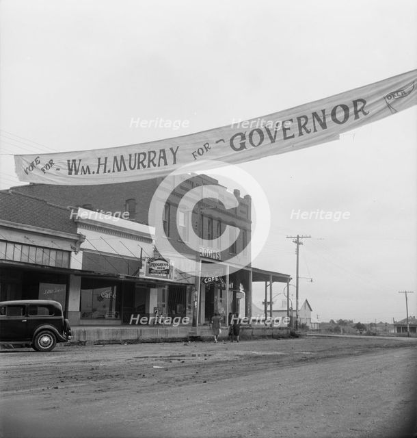 The town of Caddo in southeast Oklahoma, 1938. Creator: Dorothea Lange.