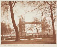 The Tower Bridge from the Tower grounds. From the album: Photograph album - London, 1920s. Creator: Harry Moult