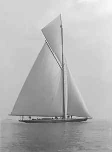 The towering 10,450 sq ft sail area of Shamrock IV 1914. Creator: Kirk & Sons of Cowes