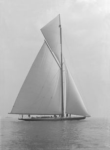 The towering 10,450 sq ft sail area of Shamrock IV 1914. Creator: Kirk & Sons of Cowes