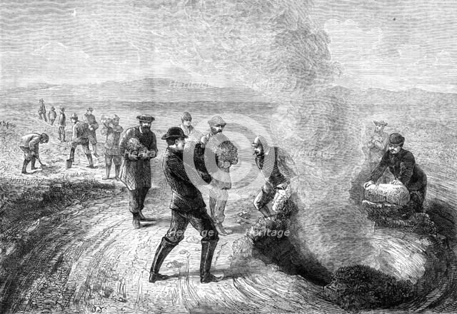 The Tourist in Iceland: feeding the Strökr, or Churn Geysir, 1881. Creator: Unknown.