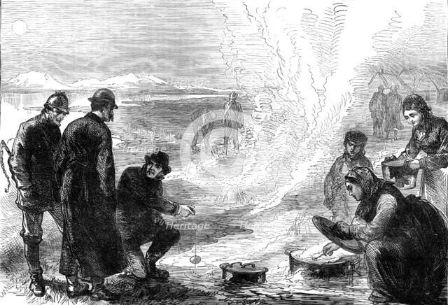 The Tourist in Iceland: on the road to the geysirs - boiling eggs in the hot springs, 1881. Creator: Unknown.
