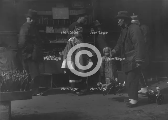 The toy peddler, Chinatown, San Francisco, between 1896 and 1906. Creator: Arnold Genthe.