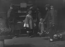 The toy peddler, Chinatown, San Francisco, between 1896 and 1906. Creator: Arnold Genthe