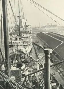 "The Traffic Still Quickens; Still The Vessels Grow Bigger" Liners In Tilbury Docks 1937. Creator: Fox