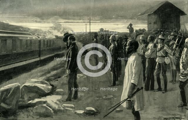 'The Train Conveying the Remains of Mr.  Rhodes Saluted by the Blockhouse Guards', 1902. Creator: Ernest Prater.