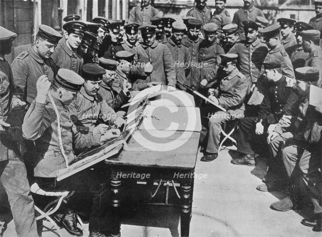 'The treatment of German wounded', 1915. Artist: Unknown.