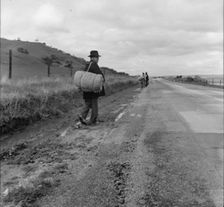 The trek of bums, tramps, single transients and undesirable indigents out of LA County, CA, 1936. Creator: Dorothea Lange