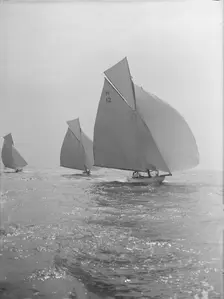 The Truant and Antwerpia IV racing with spinnakers, 27th May 1912. Creator: Kirk & Sons of Cowes