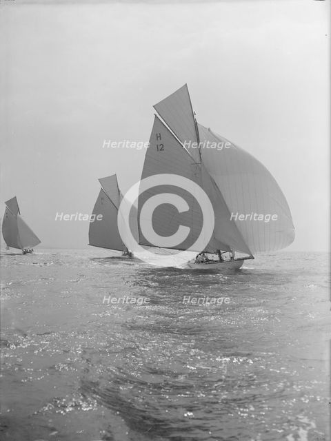 'The Truant' and 'Antwerpia IV' racing with spinnakers, 27th May 1912. Creator: Kirk & Sons of Cowes.