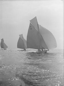 The Truant and Antwerpia IV racing with spinnakers, 27th May 1912. Creator: Kirk & Sons of Cowes