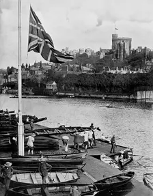 The Union Jack Flying Half mast at the Eton College Boathouse Berkshire, 1910
