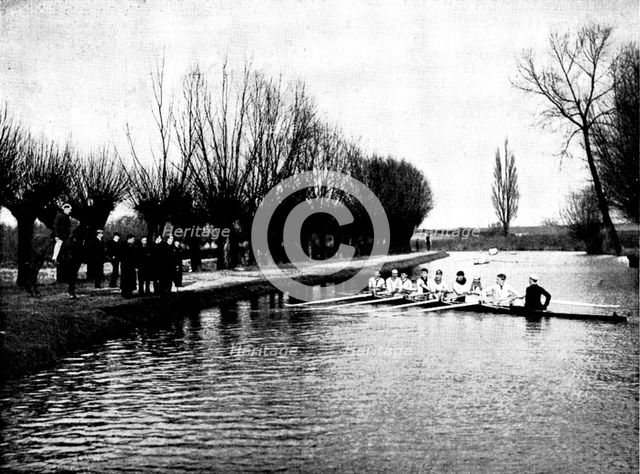 The Universities' Boat-Race: the Cambridge crew at practice - a word of advice from the coach, 1895. Creator: Stearn.