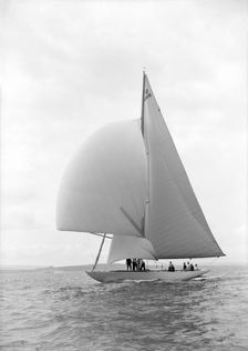 The US built 12 Metre class Vim sailng with spinnaker, 1939. Creator: Kirk & Sons of Cowes