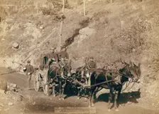 The US Paymaster and Guards on Deadwood road to Ft Meade, 1888. Creator: John C. H. Grabill