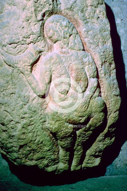 The Venus of Laussel, which may be interpreted as an earth-mother. Artist: Unknown