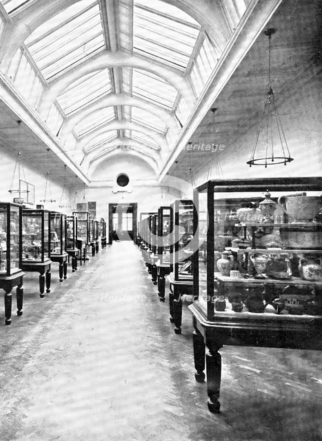 ...The Victoria and Albert Museum: in the ceramic section..., 1909. Creator: Clarke & Hyde.