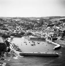The village, Victoria Pier and the harbour, Mevagissey, Cornwall, 1953. Artist: Aerofilms