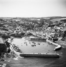 The village, Victoria Pier and the harbour, Mevagissey, Cornwall, 1953. Artist: Aerofilms