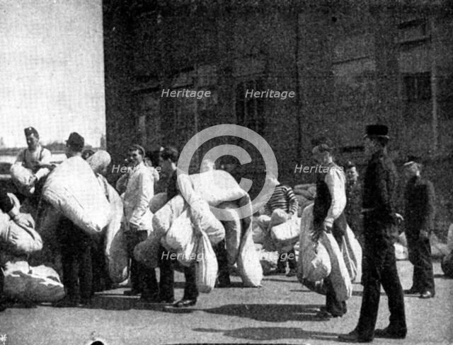 The Volunteer Manoeuvres at Brighton: Preparing to shift quarters, 1895. Creator: Symmons & Thiele.