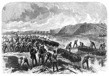 The Volunteer Review at Portsmouth: the 1st Hants Engineer Volunteers constructing a...bridge, 1868. Creator: Unknown