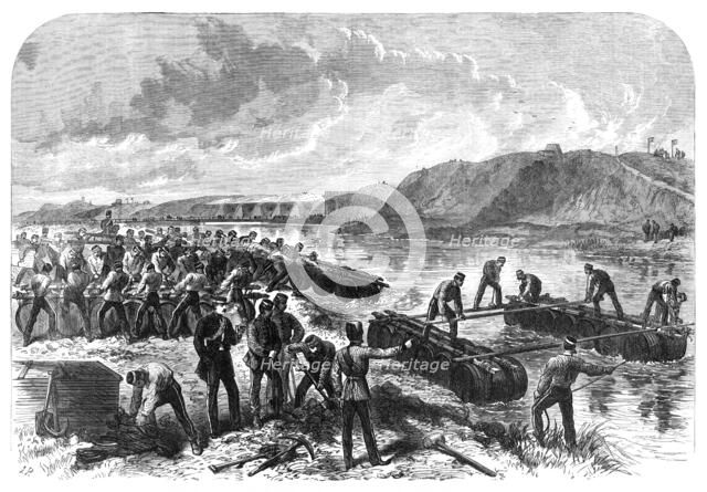 The Volunteer Review at Portsmouth: the 1st Hants Engineer Volunteers constructing a...bridge, 1868. Creator: Unknown.