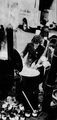The W.V.S. Did Many Jobs. Here is a W.V.S. woman managing a field kitchen , c1941 (1942)