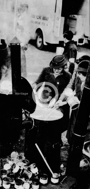 'The W.V.S. Did Many Jobs. Here is a W.V.S. woman managing a field kitchen ', c1941 (1942). Artist: Unknown.