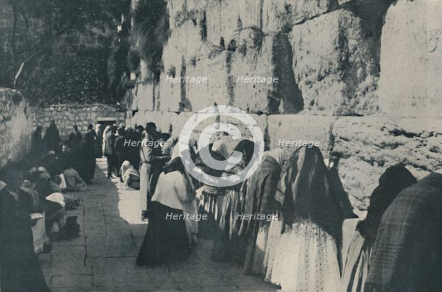 'The Wailing Wall: The Day of Lamentation for the Lost City of their Forefathers', c1935.  Artist: Unknown.
