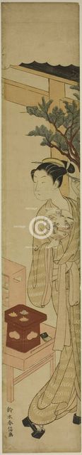 The Waitress Osen of the Kagiya Teahouse Holding a Fan, c. 1768/69. Creator: Suzuki Harunobu.