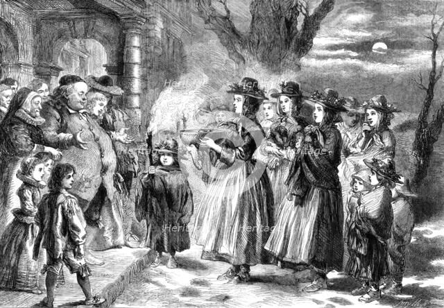 The Wassail Bowl - drawn by John Gilbert, 1860. Creator: Smyth.