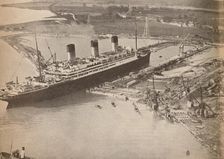 The White Star Liner Majestic entering the world's largest graving dock at Southampton c1934, (19