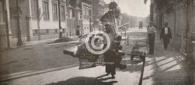 'The wicker-work vendor', 1914. Artist: Unknown.