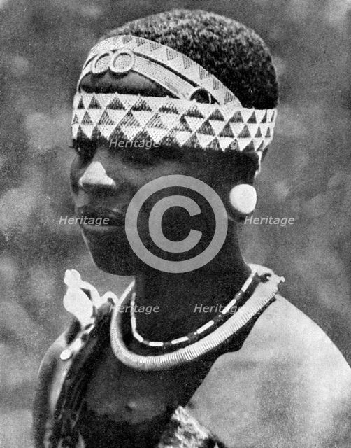 The wife of an Angoni chieftain, Mozambique, Africa, 1936.Artist: Wide World Photos