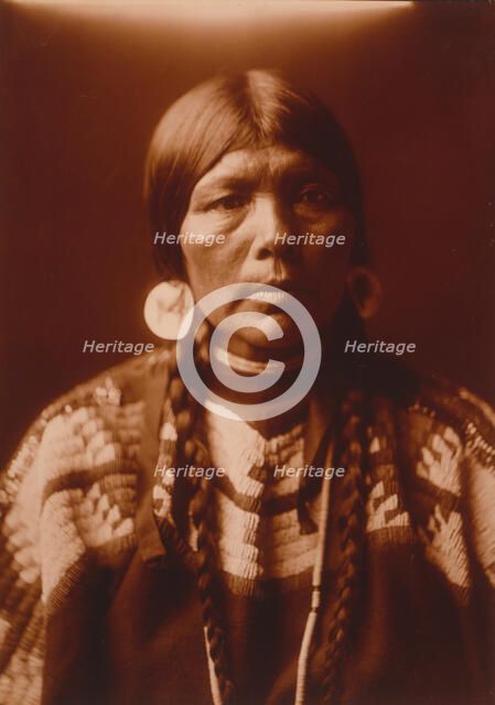 The wife of Ow High, c1905. Creator: Edward Sheriff Curtis.
