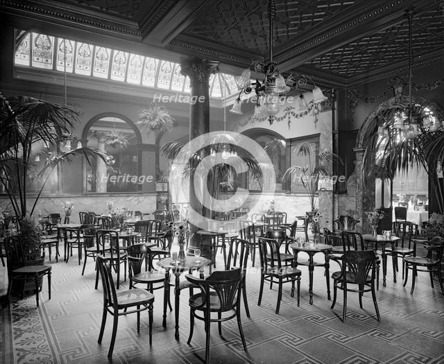The winter garden in the Monico Restaurant. Shaftesbury Avenue, Westminster, London, 1915. Artist: Bedford Lemere and Company