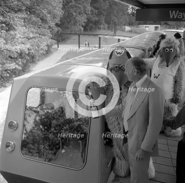 The Wombles with Lord Montagu at opening of Beaulieu Monorail 1974. Creator: Unknown.
