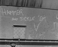 The Words: Hammer and Sickle Em Written on Some Cargo, 1943. Creator: British Pathe Ltd