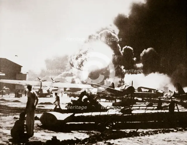The wreckage-strewn Naval Air Station, Pearl Harbour, 7th December 1941.  Creator: Unknown.